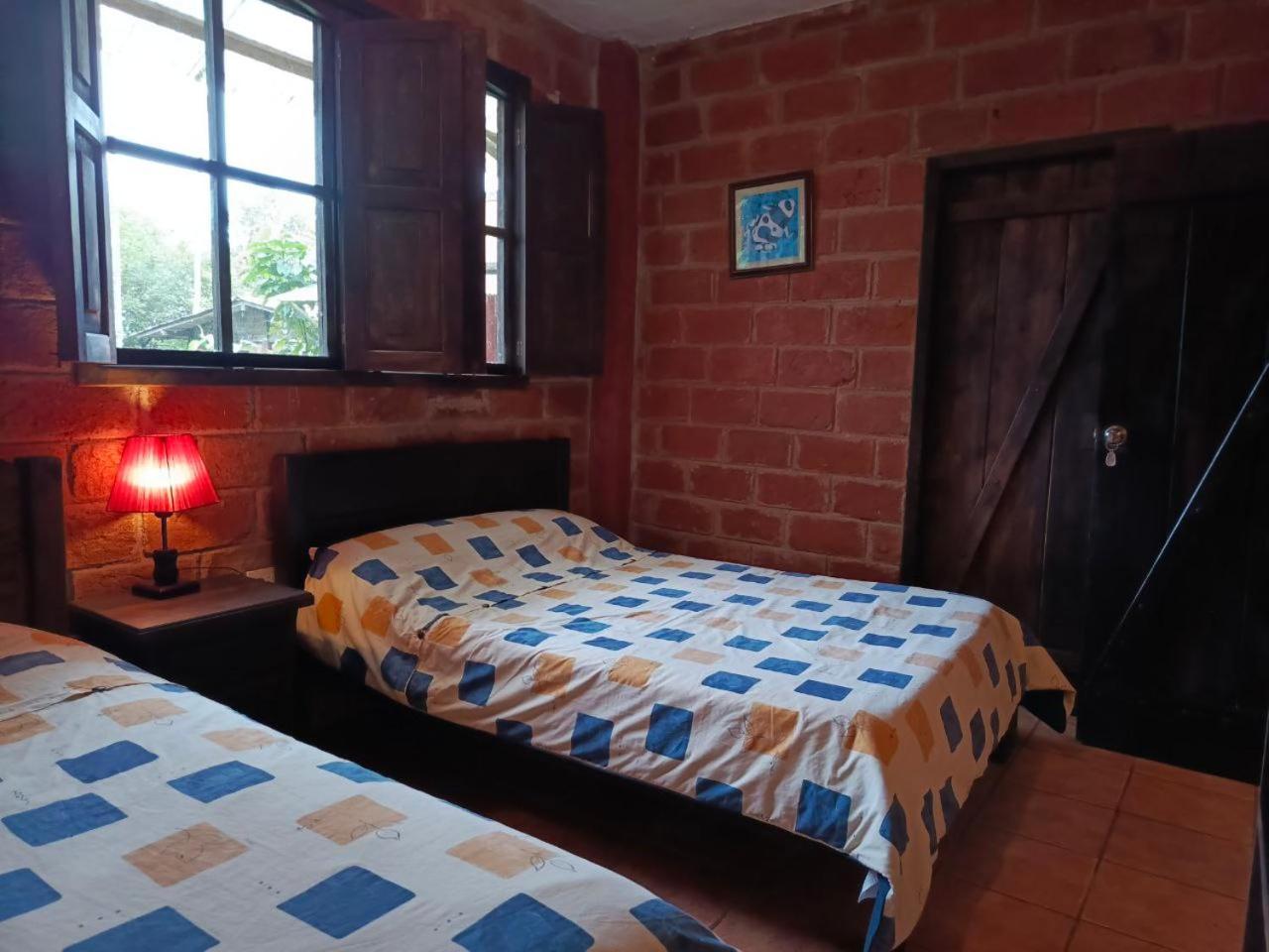 Hosteria Sapos Y Ranas Milpe ภายนอก รูปภาพ